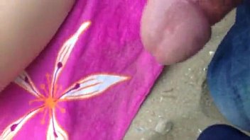 Flashing his dick and cumming next to beach babe teen